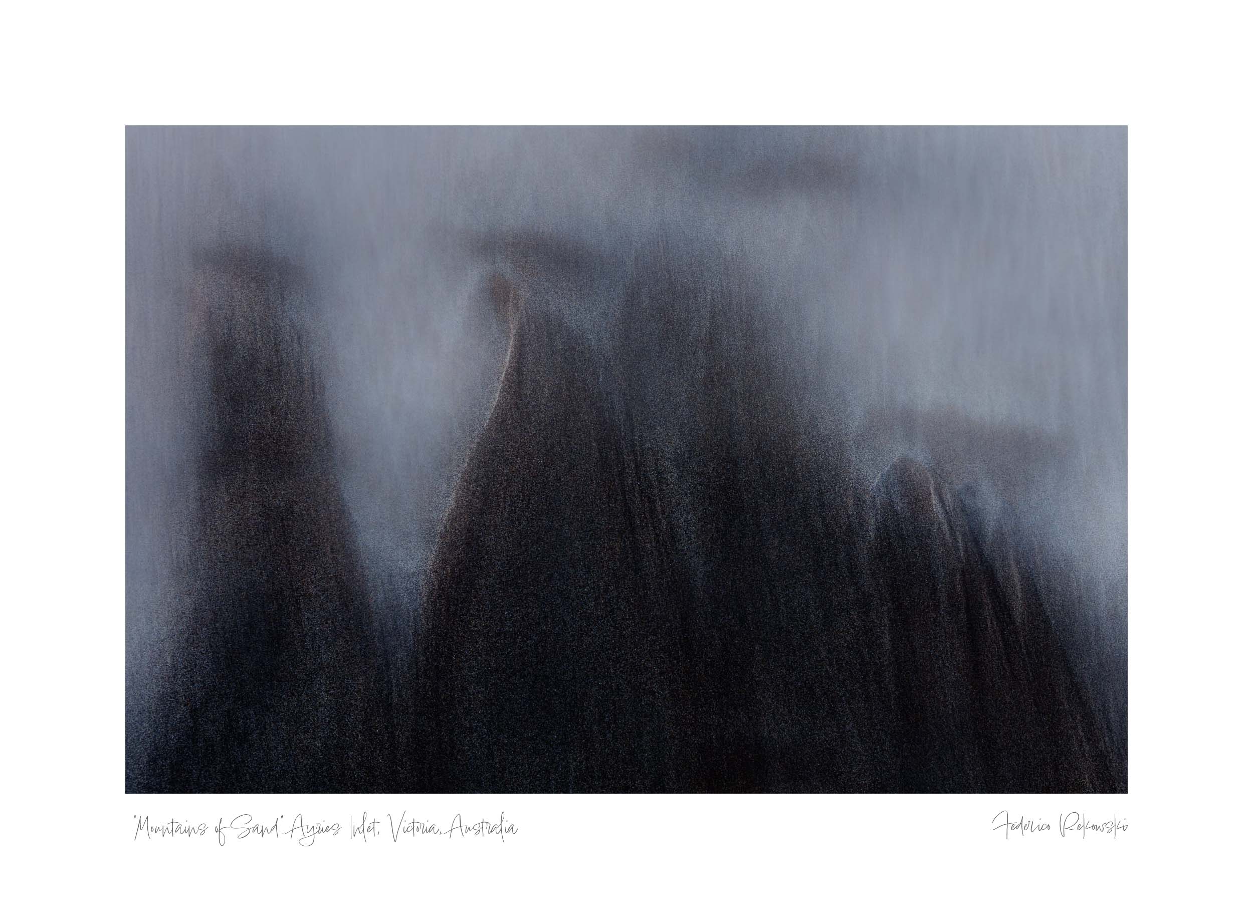 Abstract image of sand dunes in Ayries Inlet, Victoria, resembling mountain peaks in a mist-like effect.